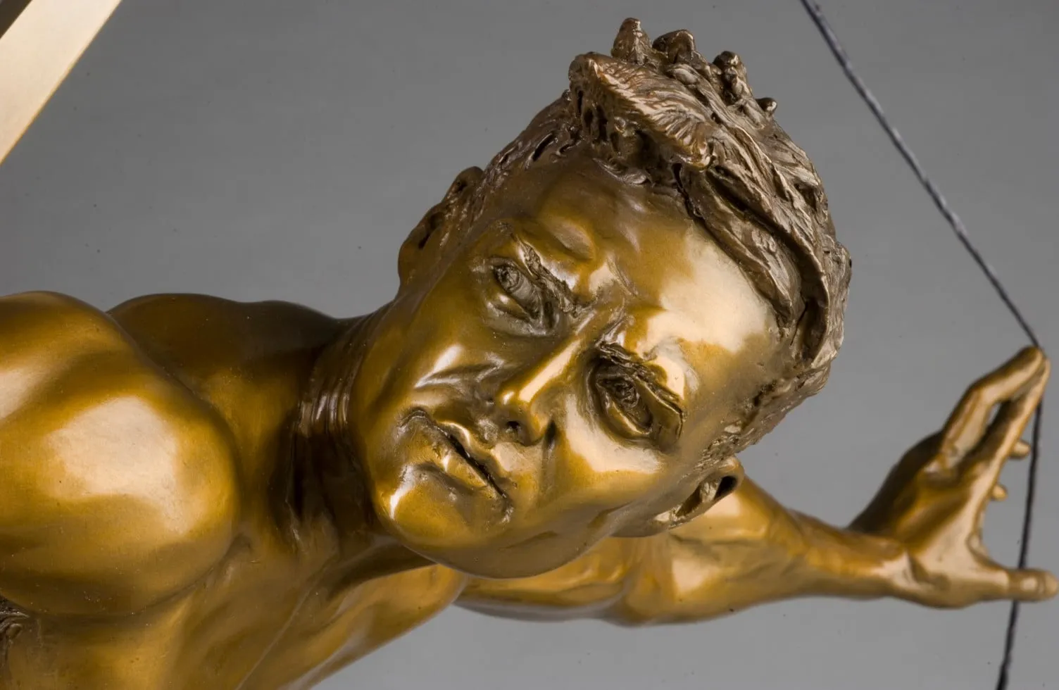 Arrow, bronze sculpture by Colleen Black, close-up of the face